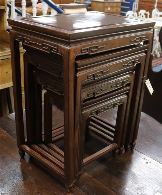 A quartetto of Chinese carved hardwood tea tables